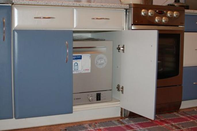 Как встроить посудомоечную машину в готовую кухню – пошаговая инструкция